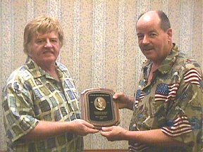 Danton presenting Lifetime Achievement Award to Bill Hillman