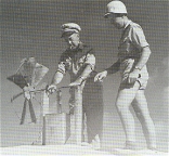 ERB with son Hulbert examining windmill power aparatus