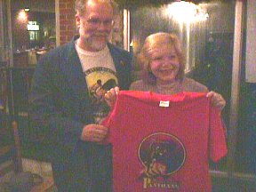 John Tyner presenting a Panthan T-Shirt to Mary Burroughs