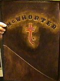 Hand-tooled leather case with doodad presented to George McWhorter by fan