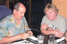 Danton and Bill examining watches at Blues Club