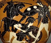 Hercules battles the Amazons. The Amazon has fallen to one knee, supported  by the shield on her left arm. A wrapped object at her waist may represent the prized belt.