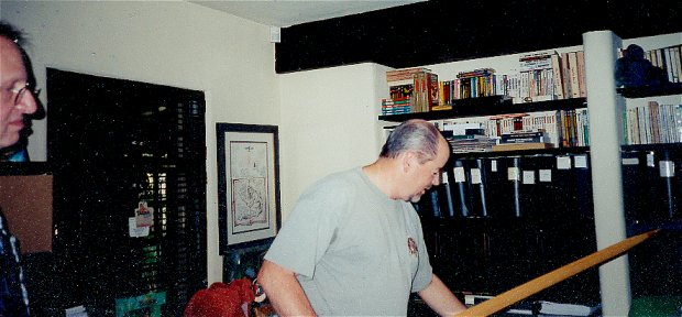 Marv Wolfman observing Danton Burroughs with John Carter's sword