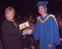 Dad presenting son Robin with degree at Convocation