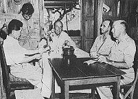 Correspondent Ed interviewing Jap prisoner