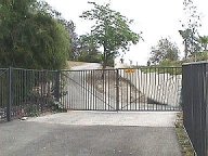 Driveway gate at the bottom of lane up to Tarzana Ranch