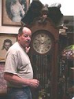 Danton examines the giant grandfather's clock