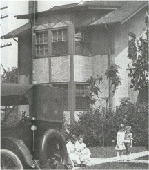 Joan with mother and brothers at 6415 (later 414) Augusta St. Oak Park