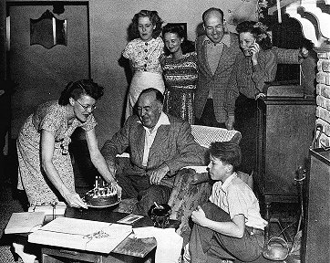 Joan serving the cake at Ed's birthday party, September 1: Joan, little Joanne, Ed, Jane, Jack, Marion, Mike