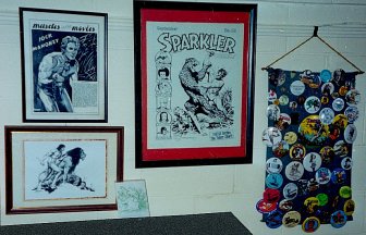 Mike Grell Tarzan art in bottom left corner