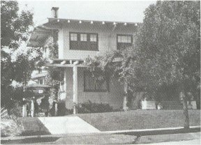 The Burroughs Packard Twin Six 1-35 touring car parked at 355 South Hoover St. ~ Los Angeles