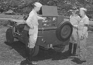 ERB with the 112th Cavalry in New Caledonia with his jeep and officers