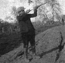 Young Hully Burroughs and rifle at Tarzana