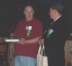 Laurence Dunn receiving plaque from George McWhorter