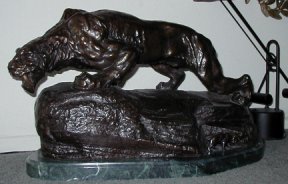 Sabre Tooth Tiger in Bronze Mounted on Marble