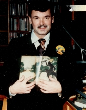 George McWhorter holding his treasured first edition of Tarzan of the Apes