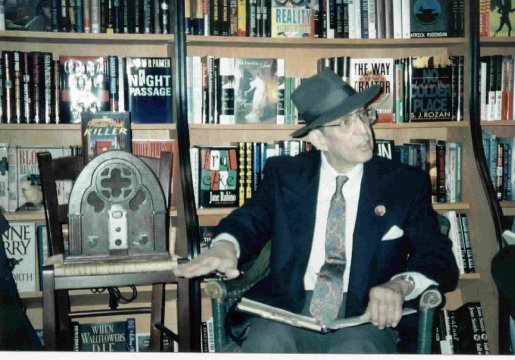Dick Lupoff surrounded by favourite things