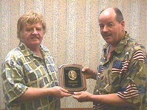 Dan presenting Life Time Achievement Award to Bill Hillman at Louisville