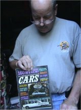 Dan with a magazine that featured his car
