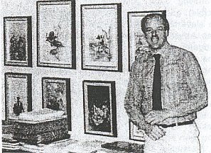 Dan and Frazetta originals in his ERB, Inc. office