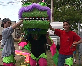 JoN and sons Ja-On and Robin prepare for the Dragon Parade in celebration of Dejah's birthday