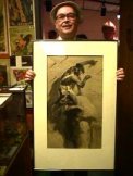 George with framed St. John interior illustration from Tarzan the Terrible