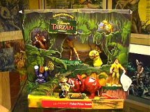 McDonalds Display of Disney Tarzan Figurines and Toys