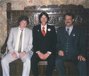 Laurence, Bill Ross, Mike Conran on a bench inside Greystoke Castle