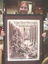 Jennifer Zeuschner Dimas Displaying the Thomas Yeates DJ Art for Dad's Bib