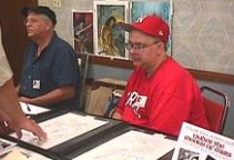 Scott Beachler with his artwork