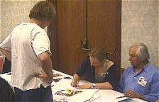 Tarak getting autograph from Julie and some guy : )