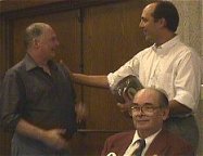Laurence Dunn (L) presenting the award to Brian Bohnett