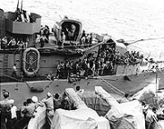 Transferring survivors of USS Porter (DD-356) between  Shaw and USS South Dakota (BB-57), on October 8, 1942