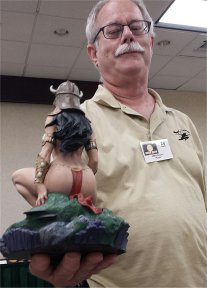 Mike Conran with auction statue