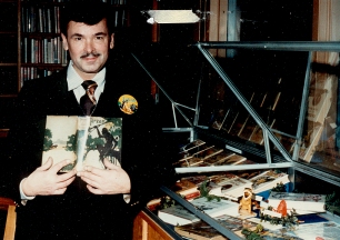 George McWhorter holding his treasured first edition of Tarzan of the Apes