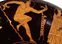 Dancer with krotala, flute case, and walking stick