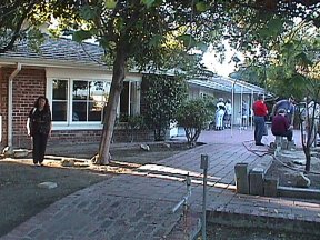 Sue-On in front of the remodelled garage building