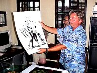 Billy York displaying Princess of Mars preproduction movie art