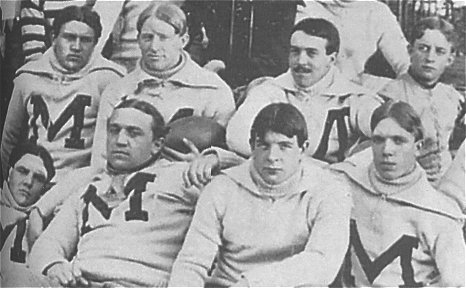 Ed Burroughs (with mustache) ~ A.T. Conners (with football)